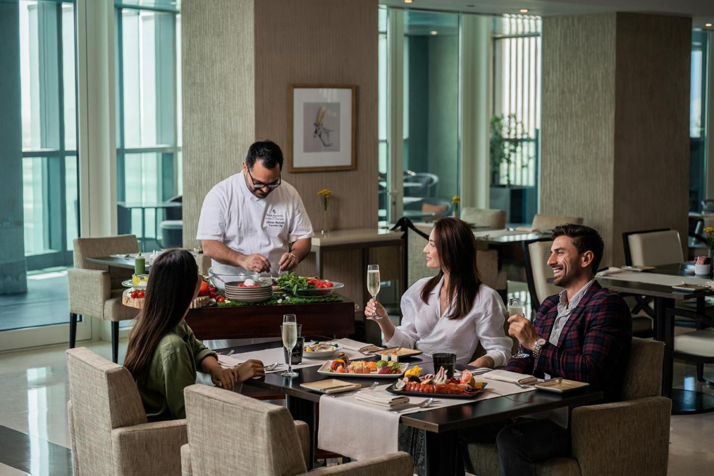 Four Seasons Hotel Abu Dhabi At Al Maryah Island Esterno foto The Club at Jumeirah